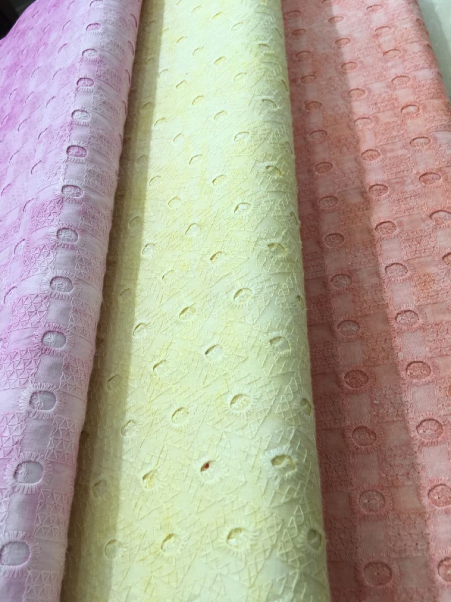 Assorted embroidery fabric swatches